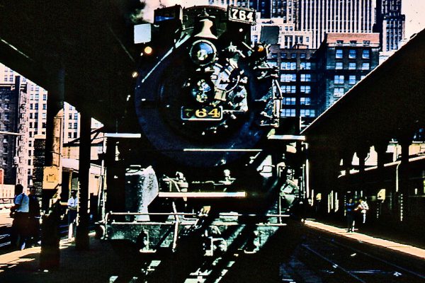 The Nickel Plate Road operated a special excursion between Fort Wayne and Chicago on June 30th, 1957. Images from this trip provided the inspiration for our Joliet Rocket artwork.